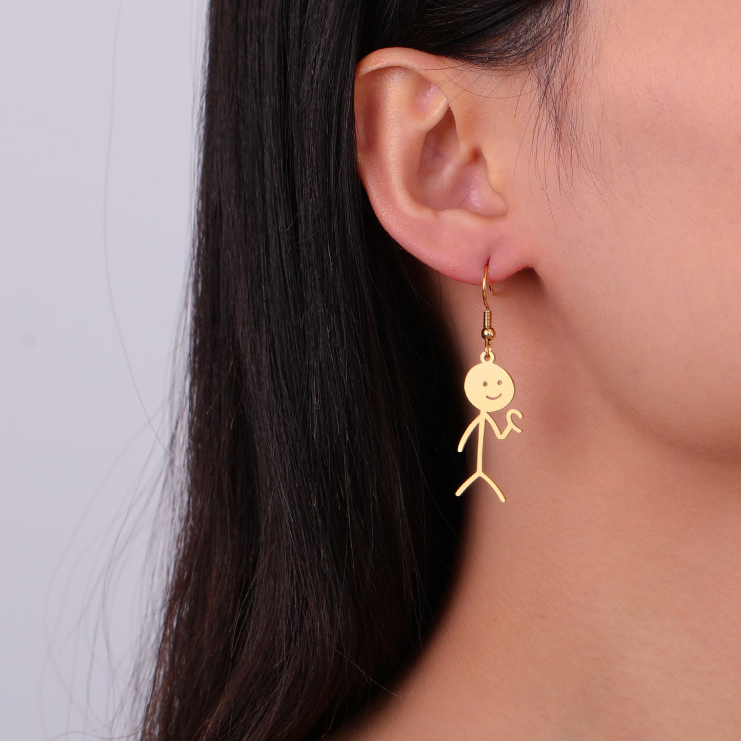 Boucles d'oreilles de dessin animé creuses coupées en acier