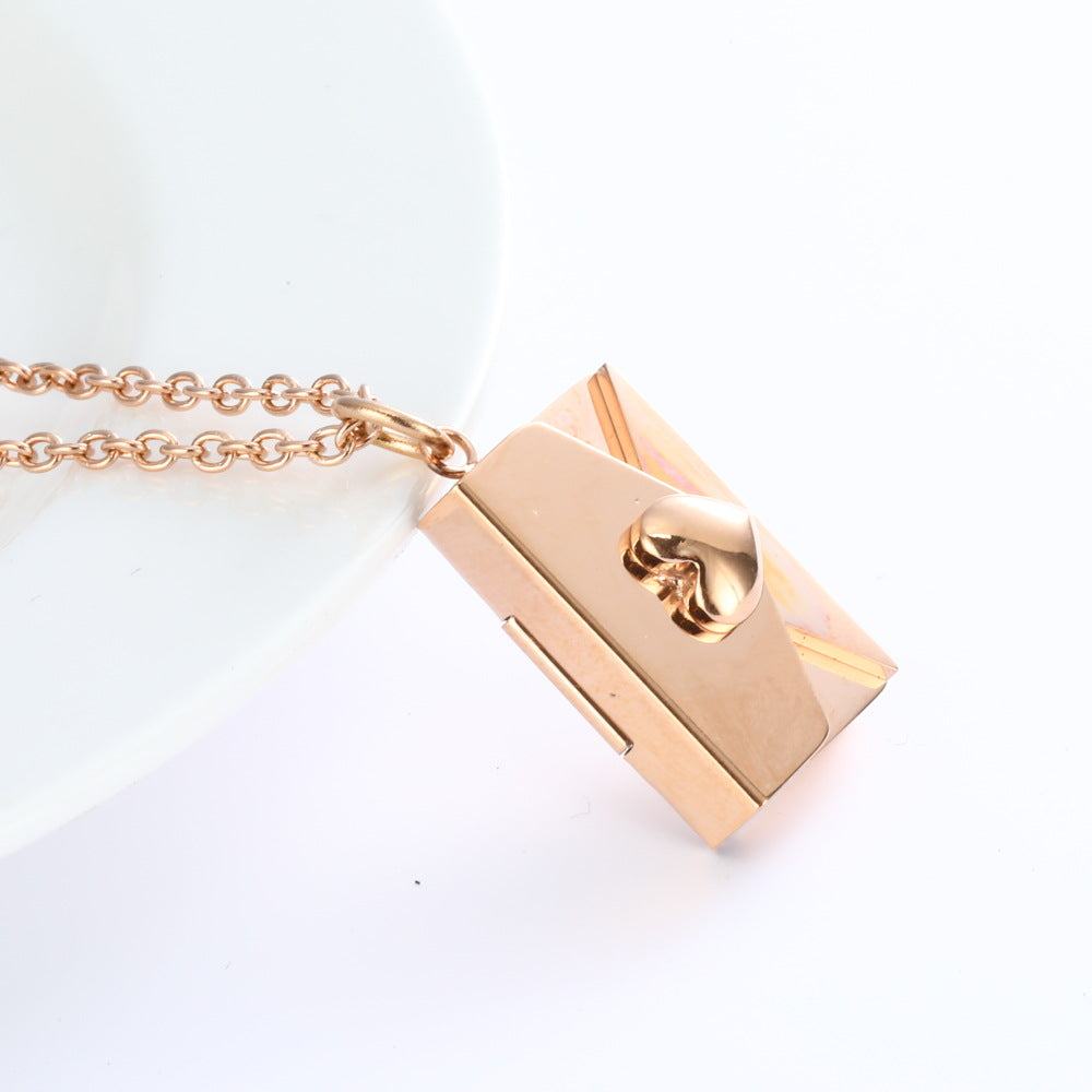 Bijoux collier unisexe enveloppe coeur
