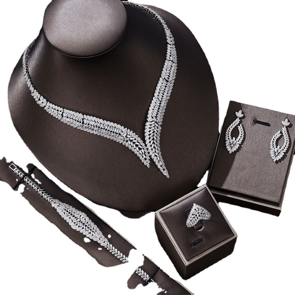 Bijoux de chaîne de clavicule en quatre pièces pour mariage nuptial